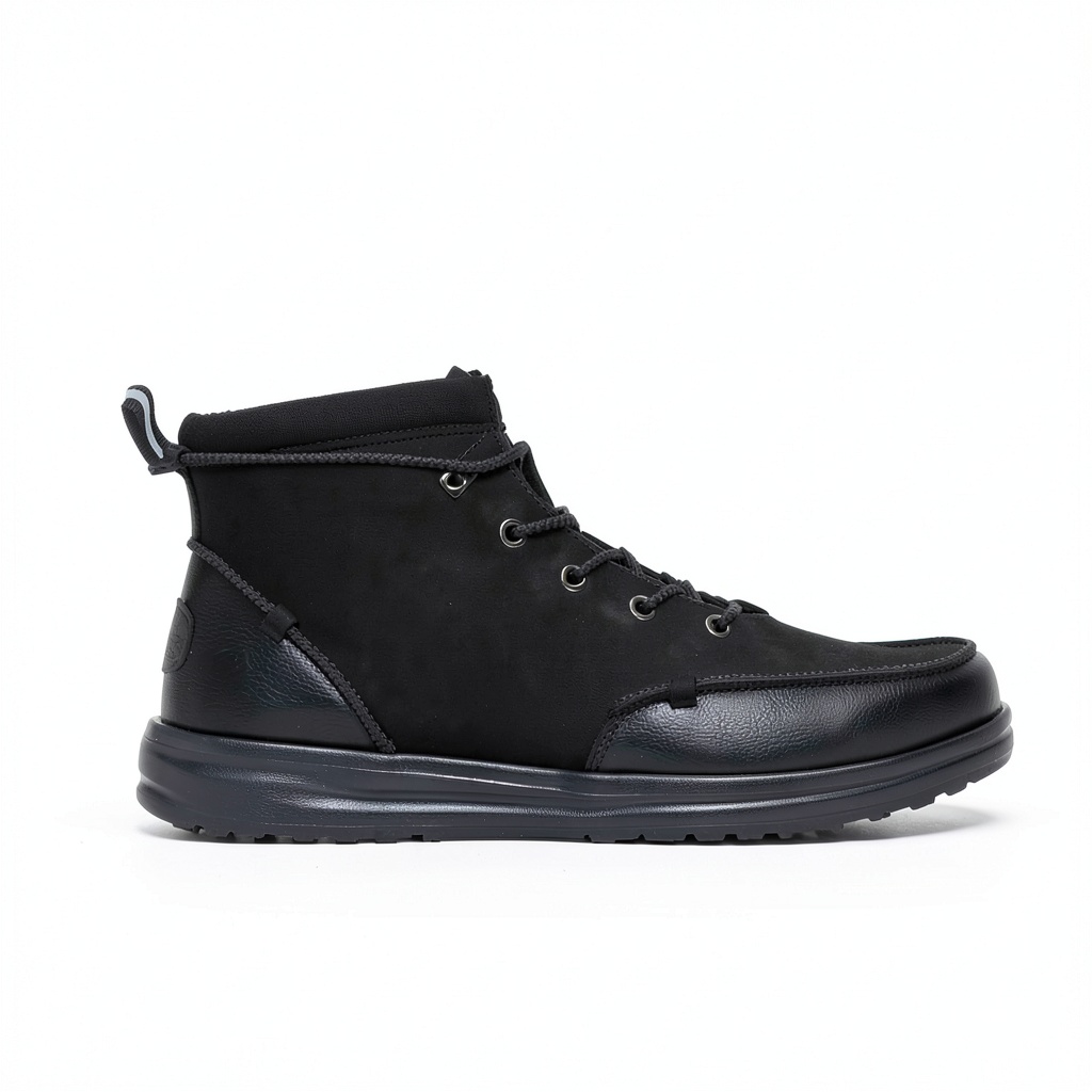 Hey Dude work boots in black displayed on a work floor